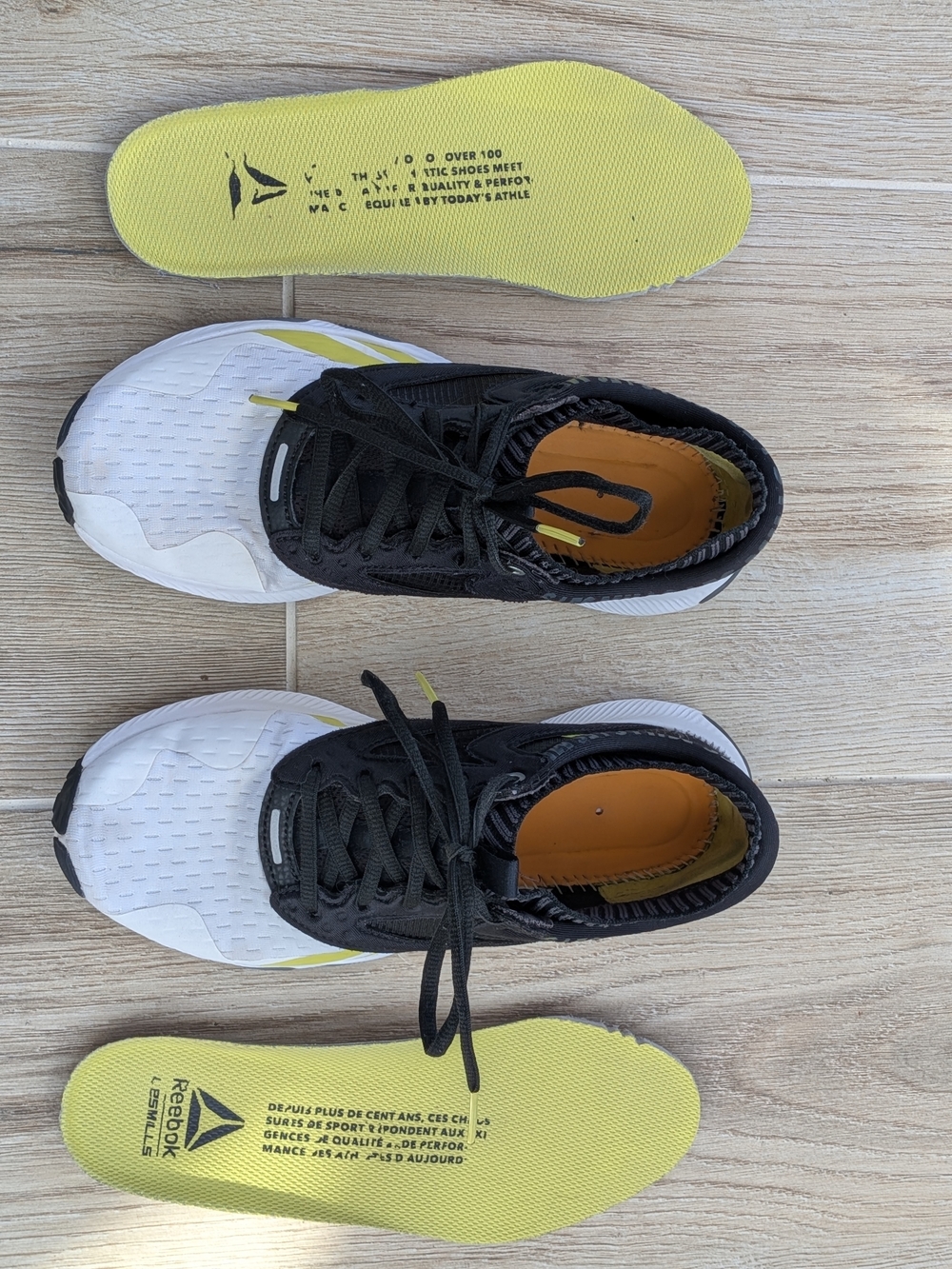 Reebok Women's Les Mills Size 7 Black & White Running Shoes with Yellow Accents